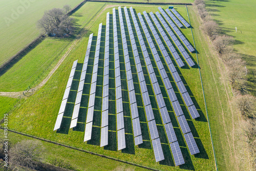 Aerial view of solar panels at a solar farm in West Sussex England, clean renewable energy