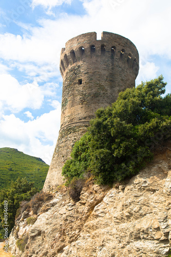 Old watchtower of Losse or tower of Losso, a Genoese tower in the municipality of Cagnano long the road of the east coast of Cap Corse, Haut-Corse Corsica photo