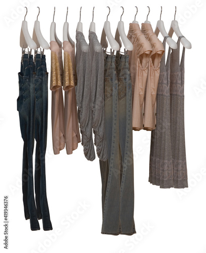 Elegant and trendy clothes for women hanging.
