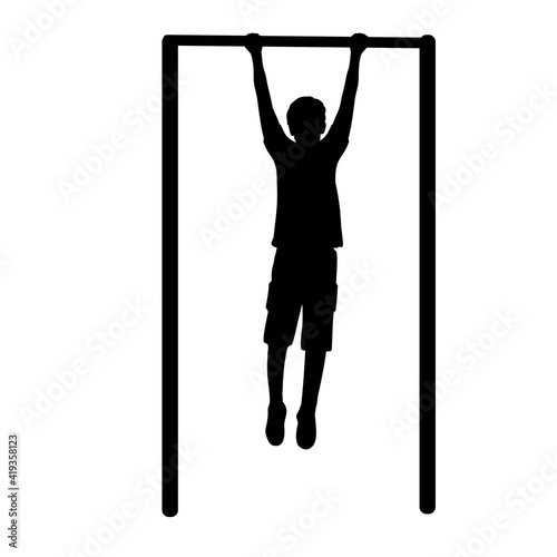 Silhouette boy playing sports on horizontal bar