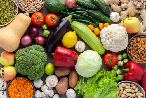 Wallpaper Mural Fresh farm organic vegetables, healthy food concept, vegetables and beans, superfood and green salad, nuts and seeds, top view Torontodigital.ca