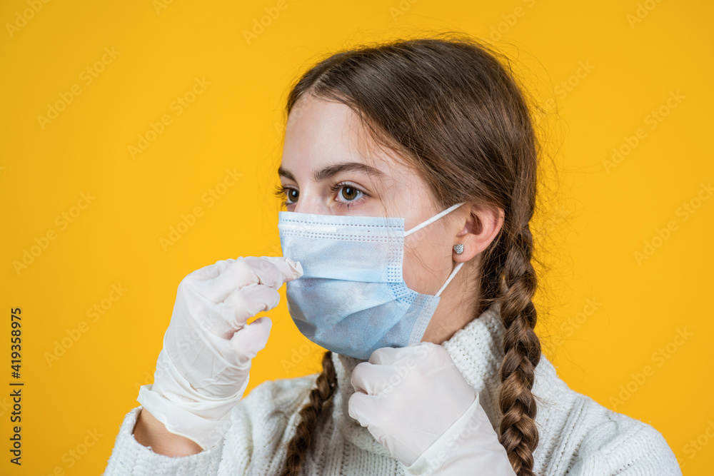girl child wearing respirator mask to protect from coronavirus, safe girl child wearing respirator mask to protect from coronavirus, safe
