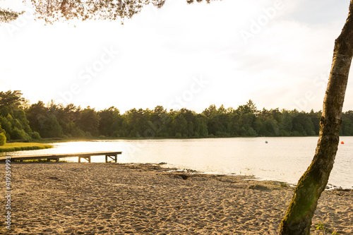 Idyllischer Badesee mit Sandstrand in Niedersachsen photo