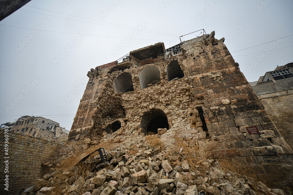 City of Aleppo and destroyed building in Syria