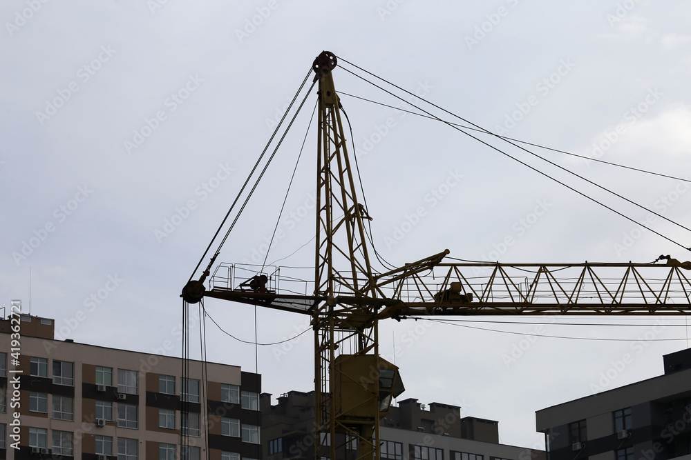 construction crane on the background of construction site