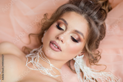 beautiful young bride in floral decor