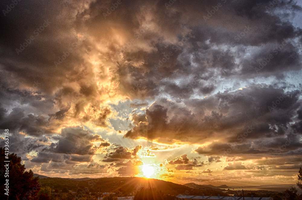 Sunrise in a partly cloudy sky Sunrise in a partly cloudy sky