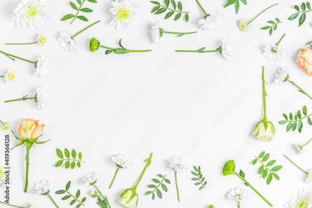 Creative layout composition of flowers on pastel background.