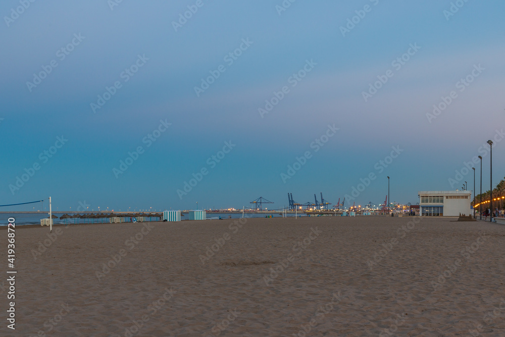 sunrise with beautiful colors at malvarosa beach of the City of valencia, costa blanca, spain