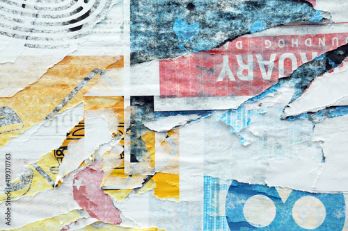 Different creased torn paper posters as background
