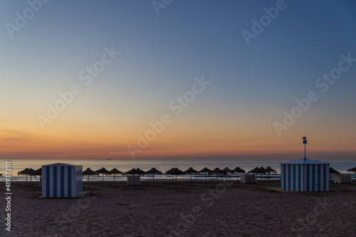 sunrise with beautiful colors at malvarosa beach of the City of valencia, costa blanca, spain © Hans Hansen