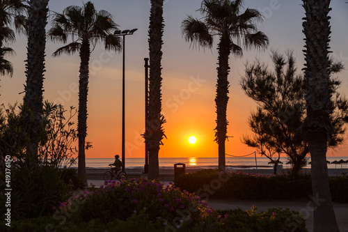 sunrise with beautiful colors at malvarosa beach of the City of valencia, costa blanca, spain photo