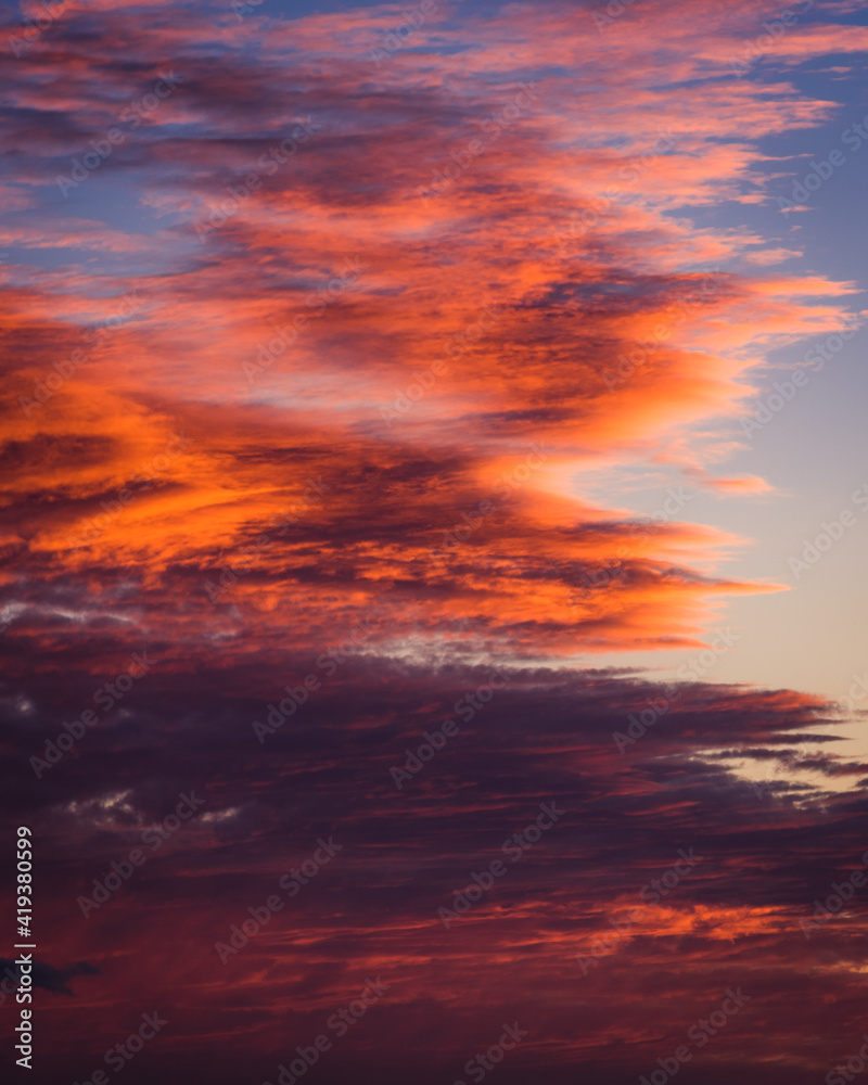 An abstract image of vividly colorful clouds at sunset in Shenandoah National Park.