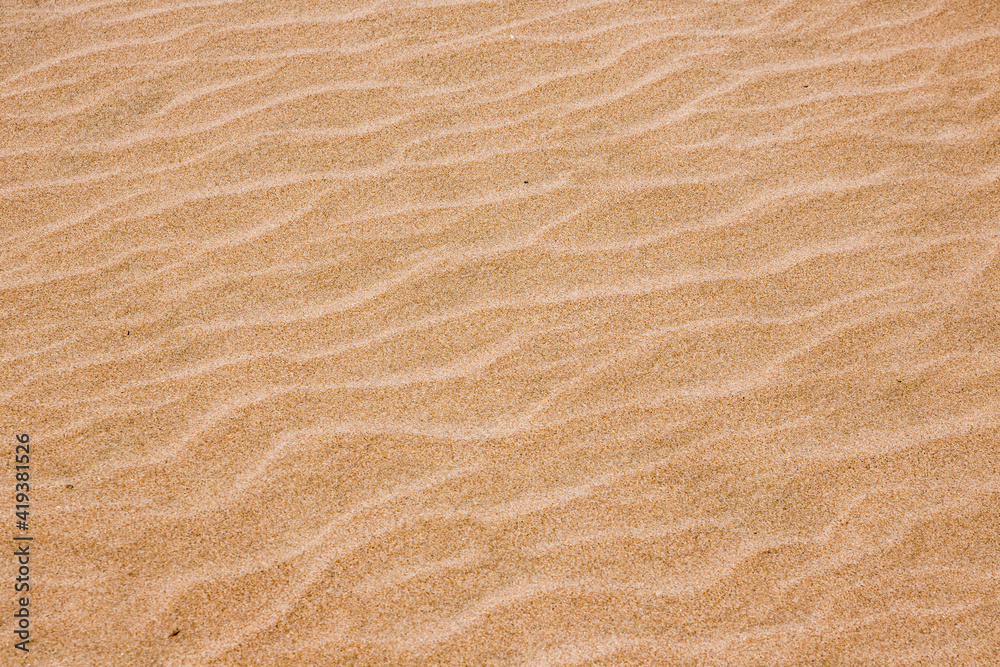 sand texture at the beach in summer at Perellonet, Passeig De Les Goles sand texture at the beach in summer at Perellonet, Passeig De Les Goles