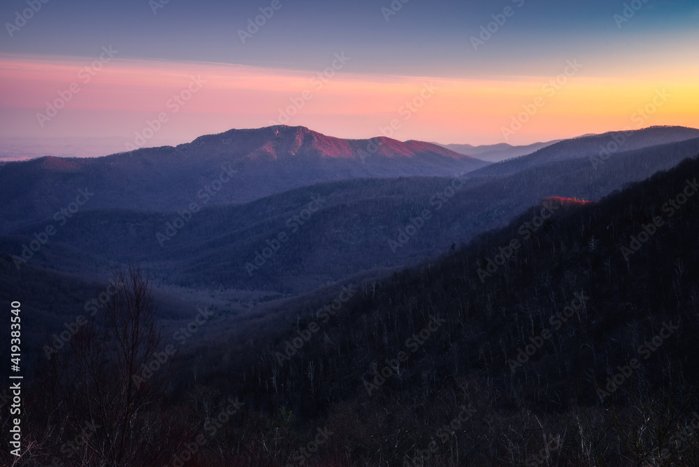 Fototapeta premium Sunset glow atop Old Rag Mountain in Shenandoah National Park.