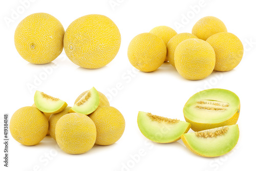 fresh galia melons and some cut ones on a white background