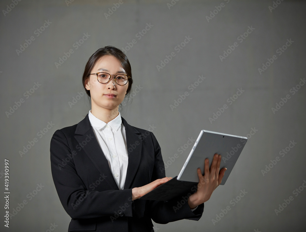 businesswoman with tablet and file businesswoman with tablet and file