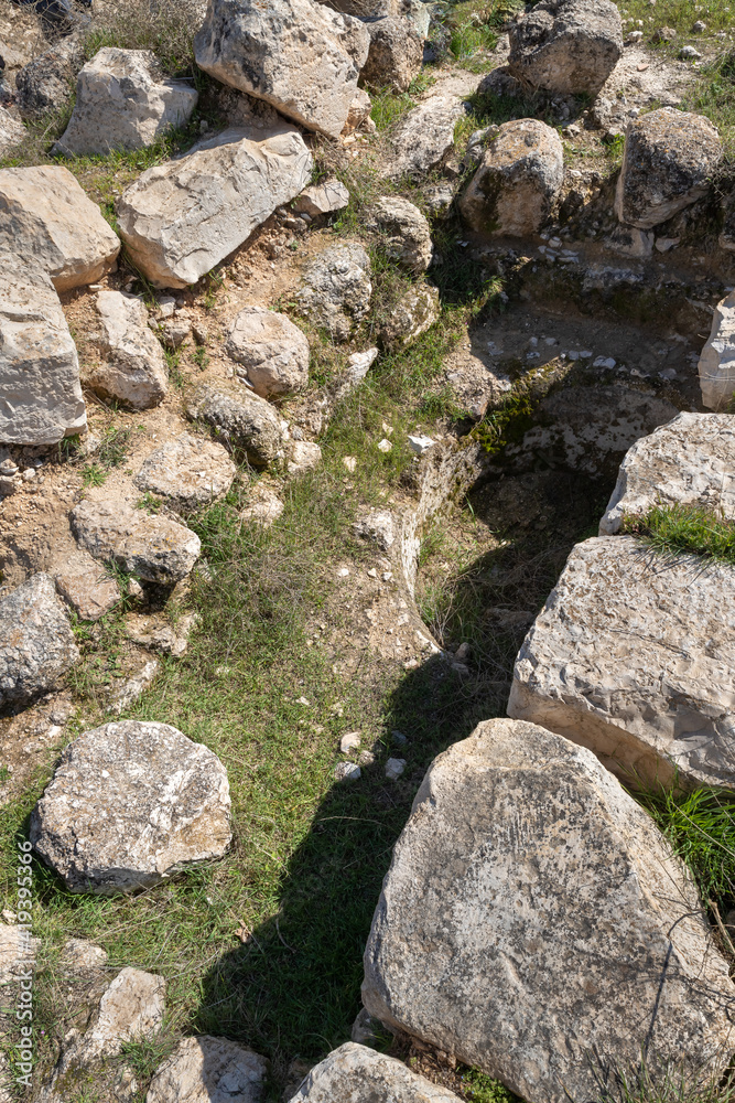 Well-preserved  remains of the ritual Jewish bath for bathing - mikveh, in the ruins of the outer part of the palace of King Herod,in the Judean Desert, in Israel