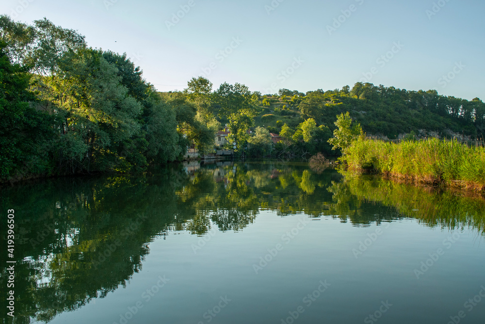 Agva, Sile, Istanbul, Turkey. It's a popular place place and resort destination on Goksu river. Reflection of trees. Reflections in the water.