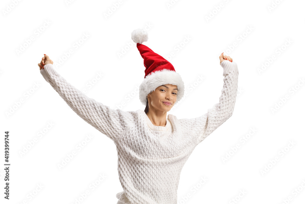 Happy young woman with a christmas hat jumping Happy young woman with a christmas hat jumping