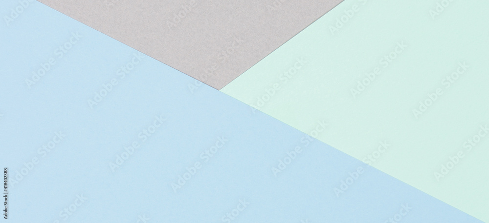 Abstract colored paper background. Minimal geometric shapes and lines in blue, light green, gray colours
