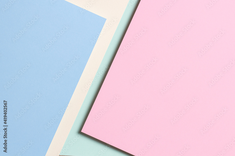 Abstract colored paper texture background. Minimal geometric shapes and lines in light blue, pastel pink, yellow, green colors Abstract colored paper texture background. Minimal geometric shapes and lines in light blue, pastel pink, yellow, green colors