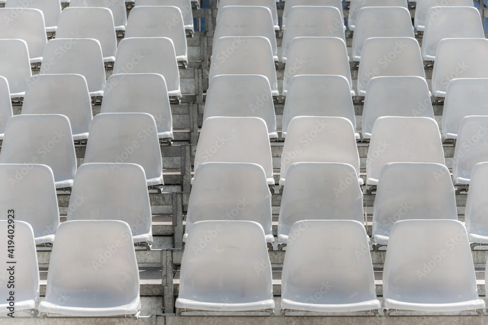 Empty rows of audience seats Empty rows of audience seats