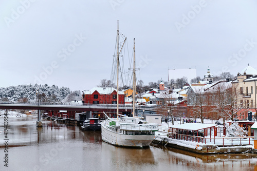 Obraz na płótnie View of the Porvoonjoki embankment and old ship from the bridge, Porvoo, Finland. w salonie