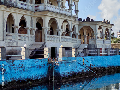 GRAND COMOROS, MORONI - JUNE 17, 2017: Close up view from street to Grand Mosque d'Iconi with waterpool.
