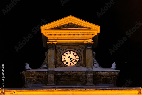 Obraz na płótnie The clock on the Porvoo contemporary Townhall in winter snowy night, Finland. w salonie