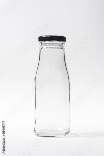 Empty bottle on white background for mockup.
