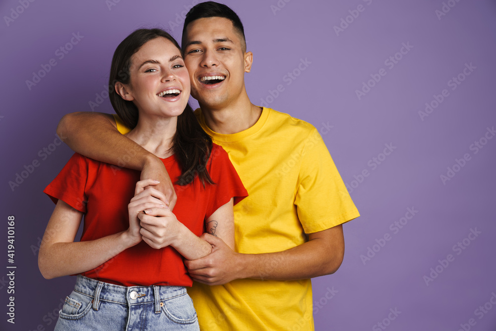 Naklejka premium Happy beautiful couple hugging and holding hands