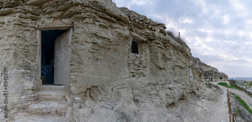 view of the caves of Arguedas and the homes in the sandstone cliffs © makasana photo