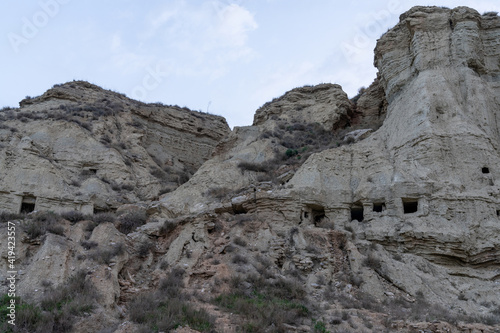 view of the caves of Arguedas and the homes in the sandstone cliffs