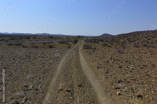 long dirt road in the desert