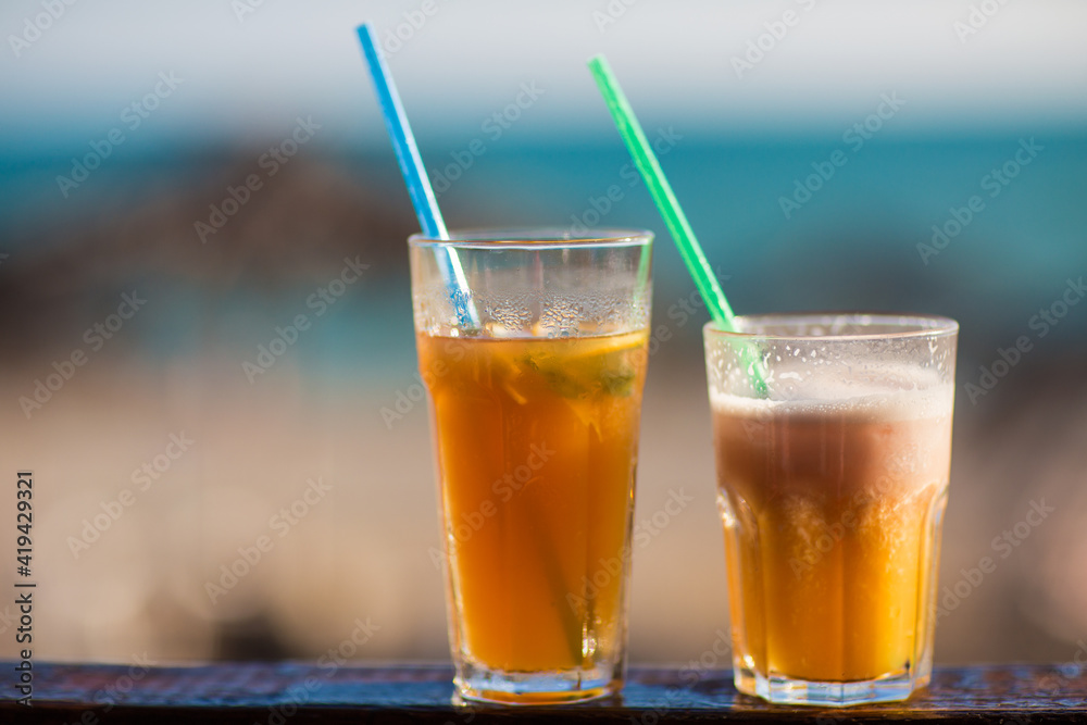 cocktail on the background of the sea and the beach
cocktail on the background of the sea and the beach