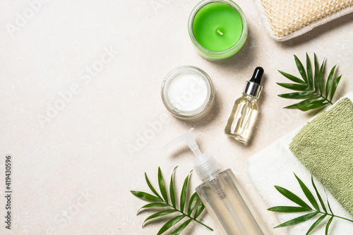 Hyaluronic acid and hyaluronic gel for face and body. Moisturizing Repairing Cosmetics. Flat lay image at stone background.