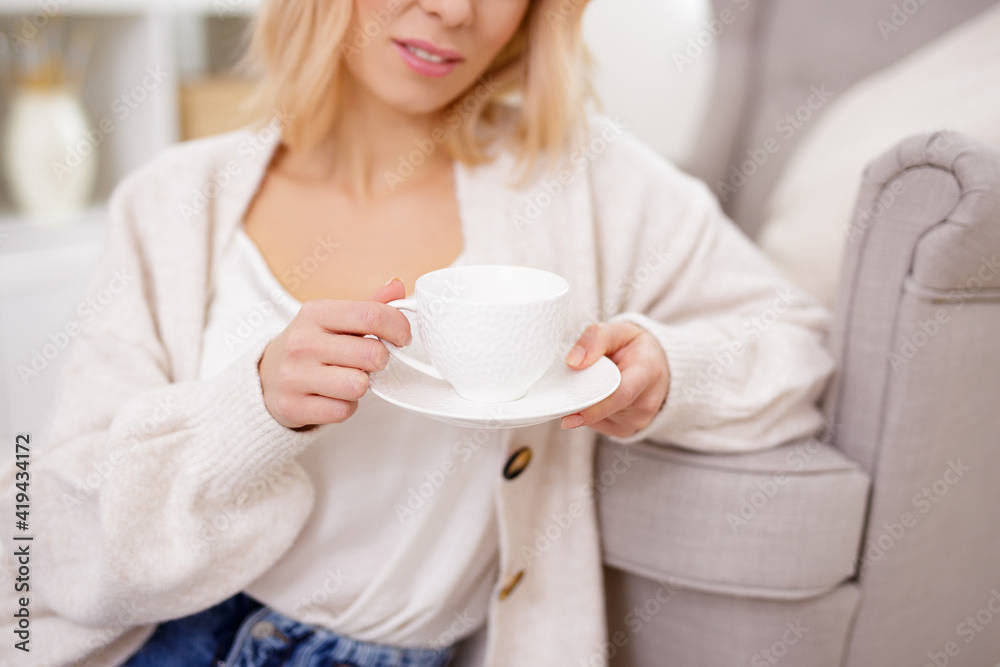 cup of coffee or tea in female hands cup of coffee or tea in female hands