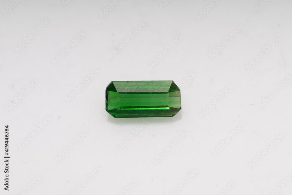 Natural green tourmaline on white background Natural green tourmaline on white background