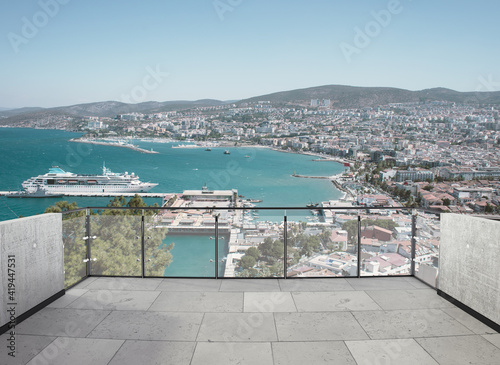 View from the balcony to the sea.Landscape. Sunny Day. Terrace with a beautiful view. Background with beautiful landscape. City near the sea.