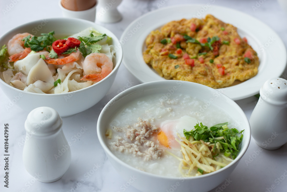American and Thai breakfast set on the marble background American and Thai breakfast set on the marble background