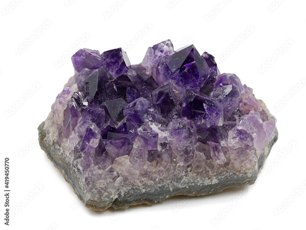 violet amethyst crystal isolated on white background