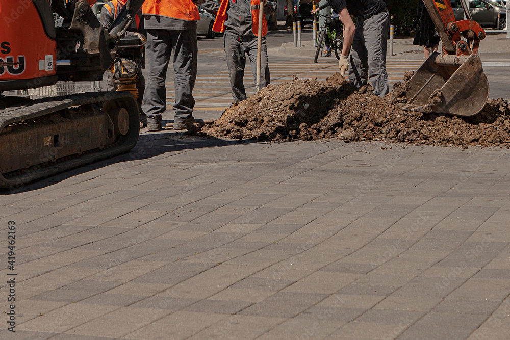 Repair of roads. Construction equipment in operation Repair of roads. Construction equipment in operation