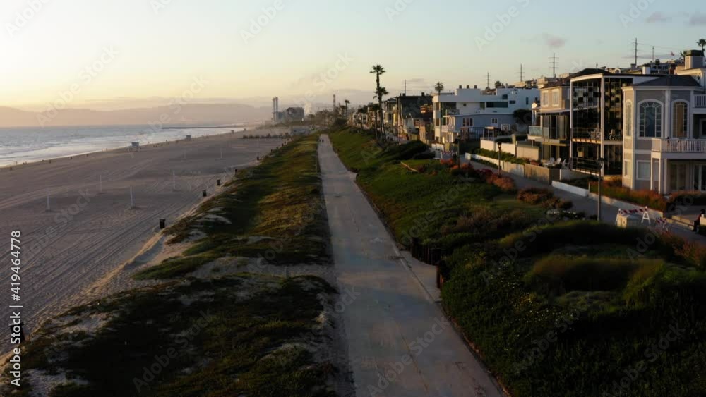 Aerial Forward: Houses By Footpath At Beach During Epidemic Aerial Forward: Houses By Footpath At Beach During Epidemic