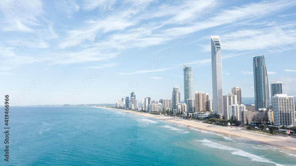 Breathtaking aerial view of modern skyscrapers located near famous sandy Surfers Paradise Beach washing by powerful ocean in Queensland Breathtaking aerial view of modern skyscrapers located near famous sandy Surfers Paradise Beach washing by powerful ocean in Queensland