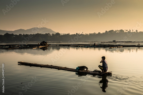 one of the seven lakes in San Pablo , Laguna, Philippines during summer season. Known as the land of the seven lakes formed by volcanic activity. its being used as a fishing farm by the locals. 