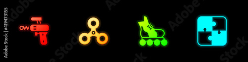 Set Ray gun, Fidget spinner, Roller skate and Puzzle pieces toy icon. Vector.
