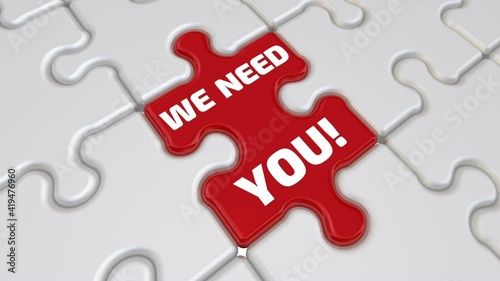 We need you! The inscription on the missing element of the puzzle. Folded white puzzles elements and one red with text WE NEED YOU! Footage video