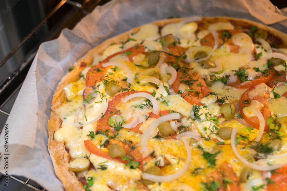Homemade pizza. Pizza in the oven. Family evening. Homemade baking. Bake. Pizza. Leisure at home. Cooking. Recipes. Homemade pizza. Pizza in the oven. Family evening. Homemade baking. Bake. Pizza. Leisure at home. Cooking. Recipes.