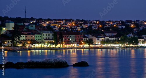 night view of the town and sea / Njivice, Croatia